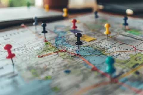 Map of country with pins in them